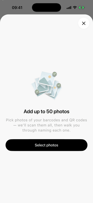 ScanKeeper bulk import screen with a button to select up to 50 photos